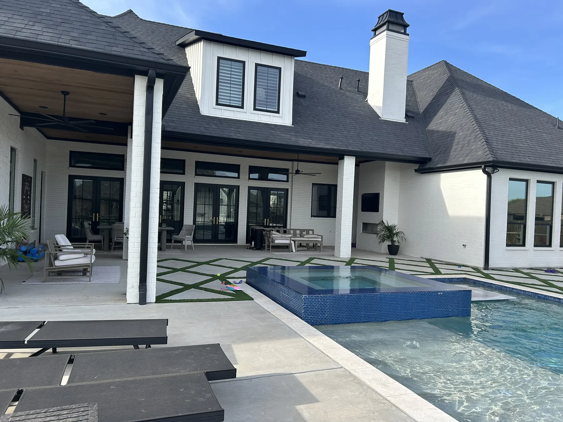 Residential property with pool and extensive rear glass
